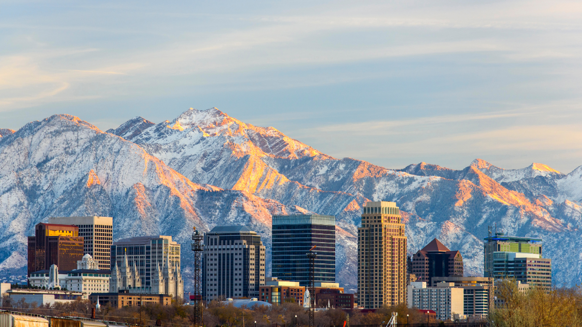 Salt lake city skyline with snowy mountains